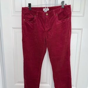 Dark red women’s corduroy pants.
